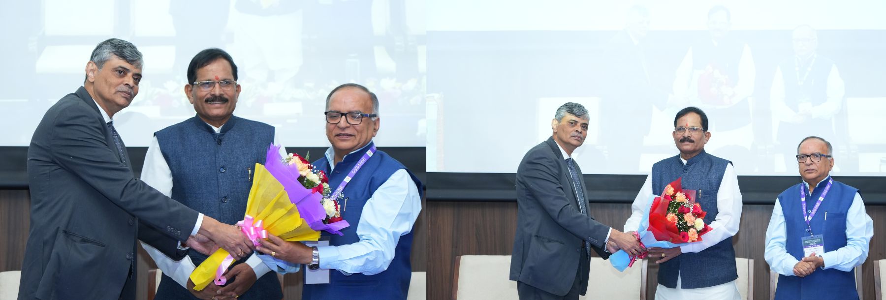 Four men in formal attire are on stage; two are handing bouquets to the other two, all smiling, in front of a large screen displaying their image in the background